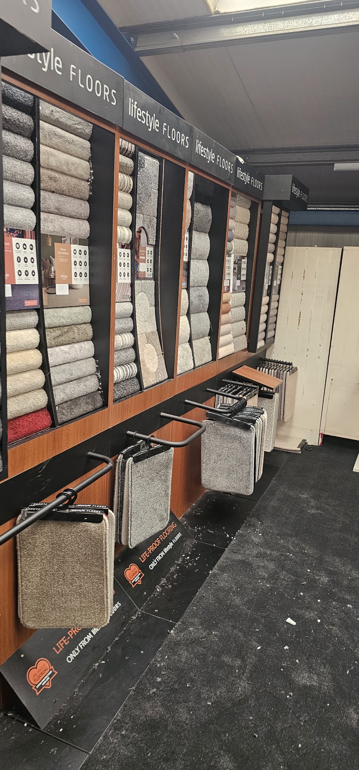Carpet range wall from leading UK brands in the showroom